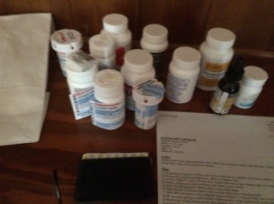 A glimpse at some of De's meds. These are taken a couple different times a day, there's a schedule. Some can't be taken with others. The paper is the doctors notes with specific instructions on how to take each medication. 